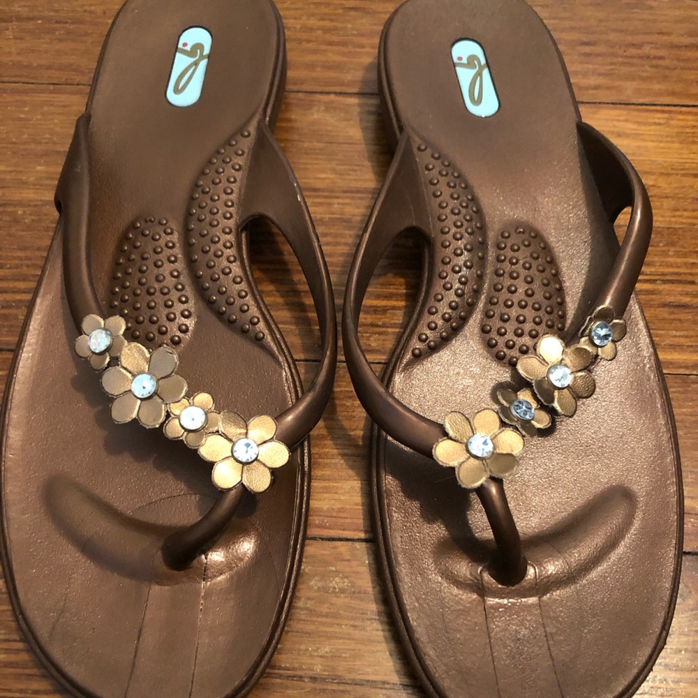 Oka B bronze rubber flip flops